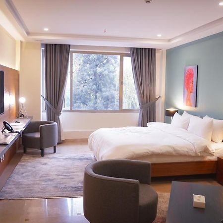 Roomy Signature Hotel, Исламабад Экстерьер фото